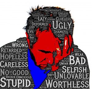 Composited image of negative word overlaying man with hand on his head